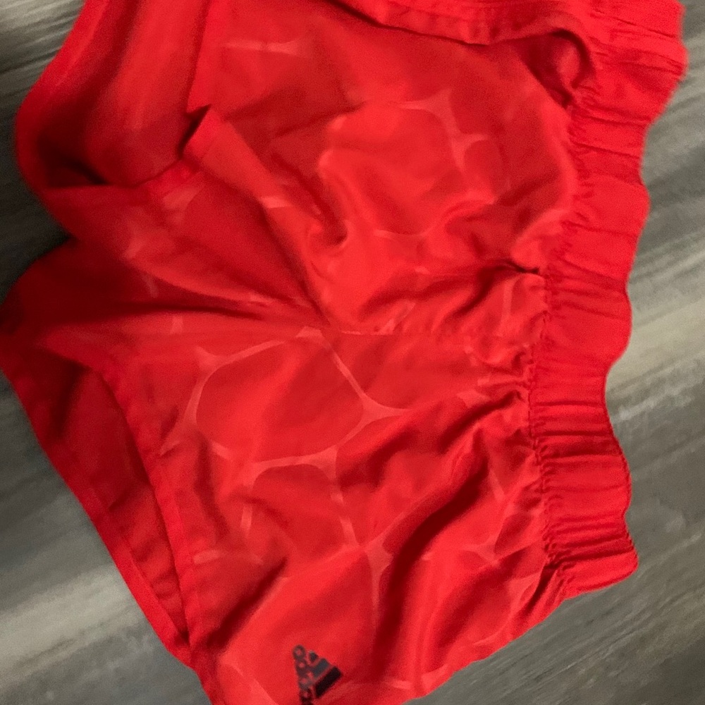 orange running shorts